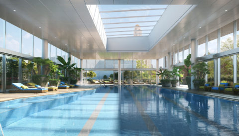 indoor pool with floor to ceiling retractable windows