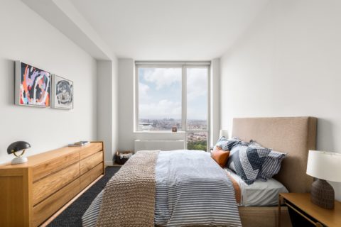 bedroom with views of brooklyn